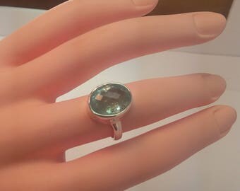 Aquamarine ring set in 92.5 sterling silver, size 7 US, faceted, free shipping, resizing availabe