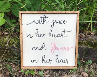 With Grace In Her Heart And Flowers In Her Hair