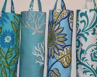 Plastic bag holders, grocery bag holders, plastic bag dispensers.
