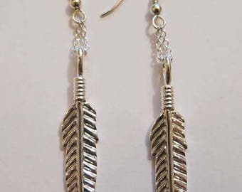 Silver patterned Indian feather earrings