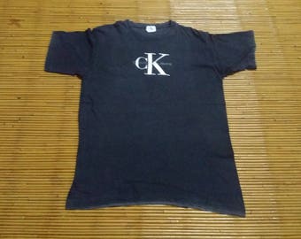 On SALE !! Vintage 90's Calvin klein jeans design Logo shirt black shirt