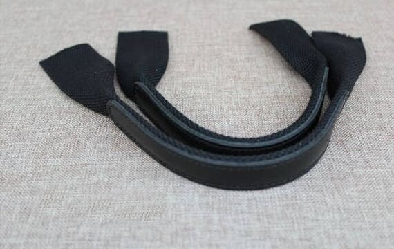 A pair of Black Canvas Strap Genuine Leather Cotton Webbing