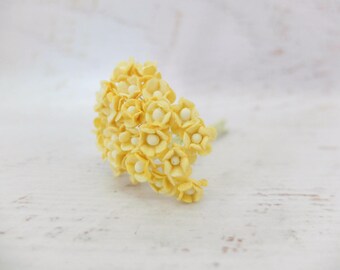 25 10mm yellow paper flowers