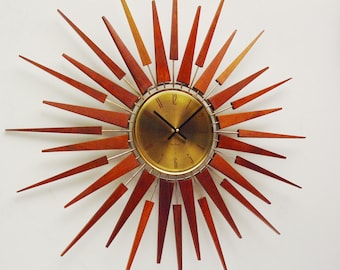 Starburst Clock by Seth Thomas, Mid Century Modern 1970s Starflower Sunburst Wall Clock. Dorm decor. Professionally Refurbished.