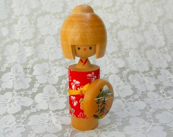 Adorable Japanese Kokeshi, contemporary wood doll, red chirimen (crepe) fabric, Mt. Fuji shield, kawaii girl