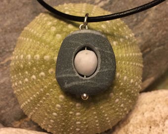 Beach stone jewelry- beach stone necklace with a beachstone inside