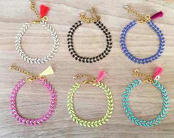 Spike studded, tassel and tiny star chain bracelet