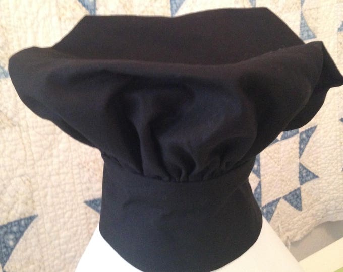 Black Child's Chef Hat. Adjustable with Hook and Loop tape. Fits ages 2 to 6.
