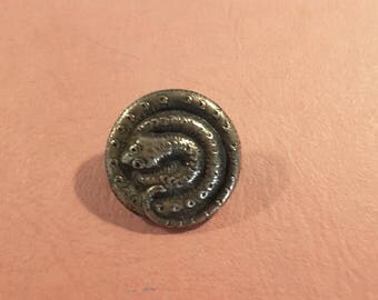 Button of a coiled snake, early 1900's
