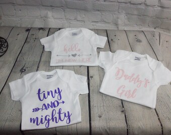 GRAPHIC BABY ONESIES