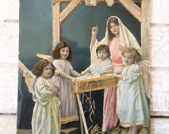 Antique Christmas postcard -Nativity Jesus mother Mary veil, crib baby hay, birth Bethlehem angel girls, gold paint french hand tinted, 1900