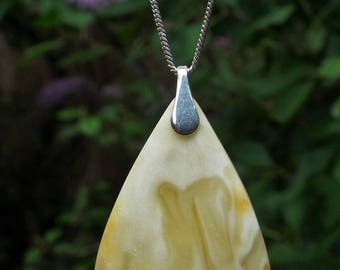 Butterscotch Baltic amber pendant with sterling silver bail