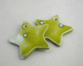 Star in ceramic make-hand 69: green olive, 3 cm