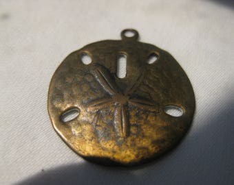 Tiny Brass Sand Dollar Pendant