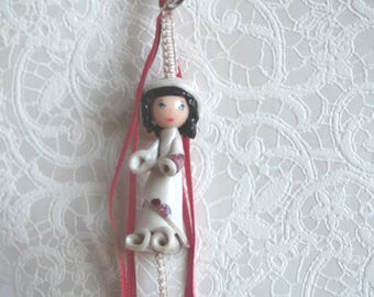 Bag charm modeling Nenette ivory and Burgundy