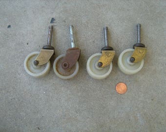4 antique Noelting faultess casters wheels