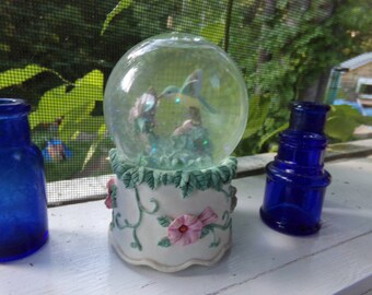 Hummingbird Musical Snow Globe . Humming Bird on a Birthday Cake Snow Globe. Vintage Musical Birthday Cake Globe.