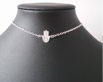 Silver choker with sterling silver hamsa charm.