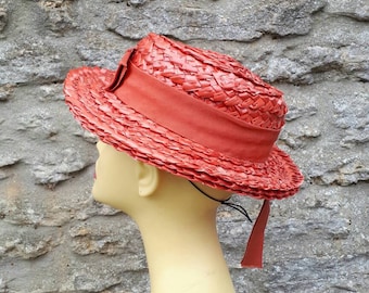Vintage orange straw boater hat