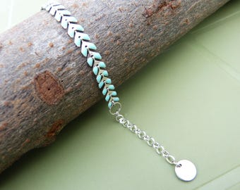 Green chained spike enameled bracelet