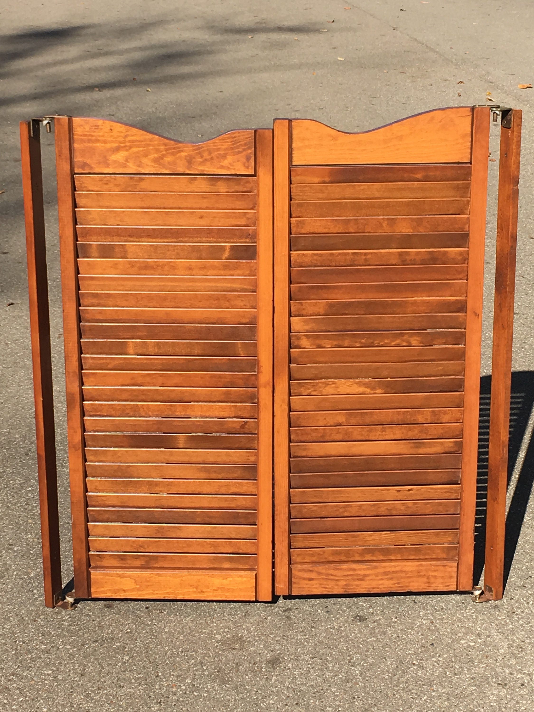 vintage-swinging-saloon-doors-decorative-brown-shutters-louvered-cafe