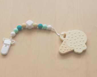 2 in 1! Velcro closure and vanilla ice cream teething toy