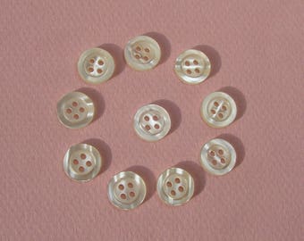 A Pack Of 20 White Pearl 8mm Buttons