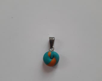 Blue and orange polymer clay pendant