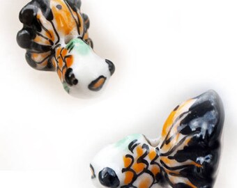 2 porcelain fish beads good quality