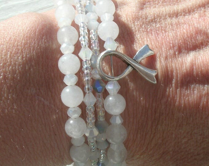 White Beaded Cancer Awareness Bracelets, silver cancer ribbon charm, stackable. memory wire, lung cancer awareness bracelets, affordable