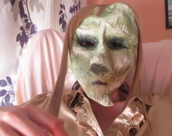 Mask paper mache. Zombie woman. Asymmetric.