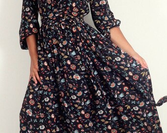 Long black dress of colorful flowers