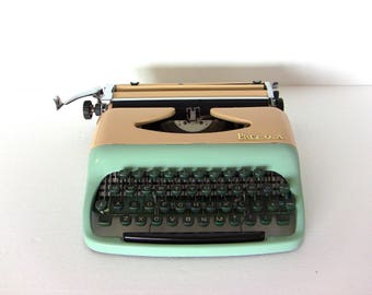 Turquoise Baby Blue Consul Typewriter Small Portable Working Qwerty Keyboard, Metal, New Ribbon, Consul Drip Shape