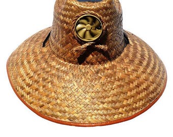 Straw hat with solar panel fan
