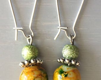 Yellow and green metal and glass earrings