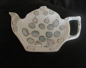 Bag Dimensions porcelain Teacup rests: 11 * 9 cm