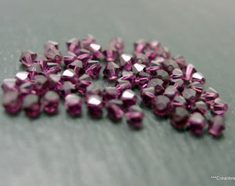 30 perles toupies facettées prune cristal swarovski 4 mm