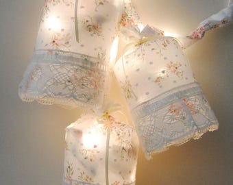 Three lamps with floral decoration