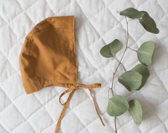 Rust tan baby bonnet