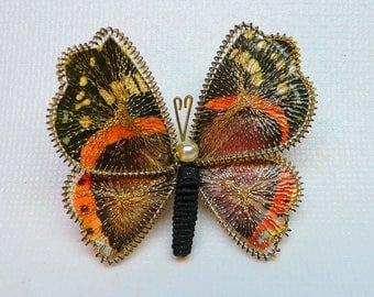 Vintage wire wrapped mesh butterfly pin with faux pearl accent