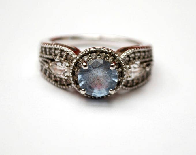 Sterling Light Blue CZ ring - Signed China 925 -Cubic Zirconia - Size 7 1/2 ring - silver ornate setting clear and bluish stones