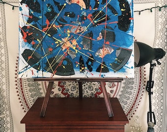 Broken Vinyl on Canvas w/ Splatter Paint