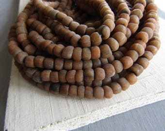 Brown grey glass seed beads , small rustic ethnic spacer , irregular tube barrel indonesia new Indo-pacific 4 to 6mm (22 inch strd) 7ab58-1