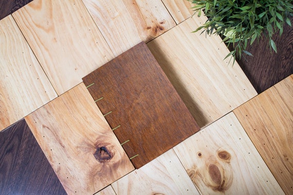 Handmade and personalized book in wood.