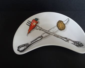Fornasetti. Mid century crescent shaped side plate. Buoni Bucconi. No.6