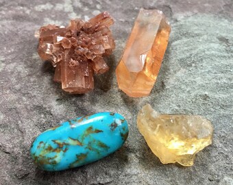 Assorted raw gemstones, aragonite, kingman turquoise, citrine, quartz