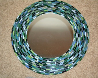 Green hues in a "London Tunnel" mosaic mirror design