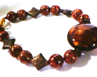 caramel, lampwork and fancy glass beaded bracelet