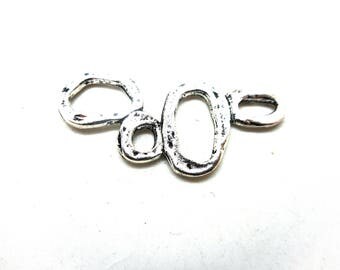 Connector made 4 round twisted silver