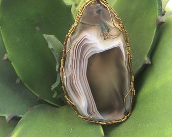 Agate wrapped in distressed brass